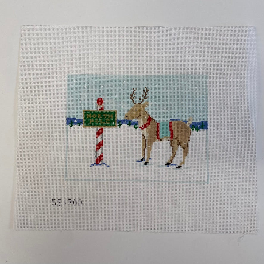 Reindeer and North Pole Sign Canvas
